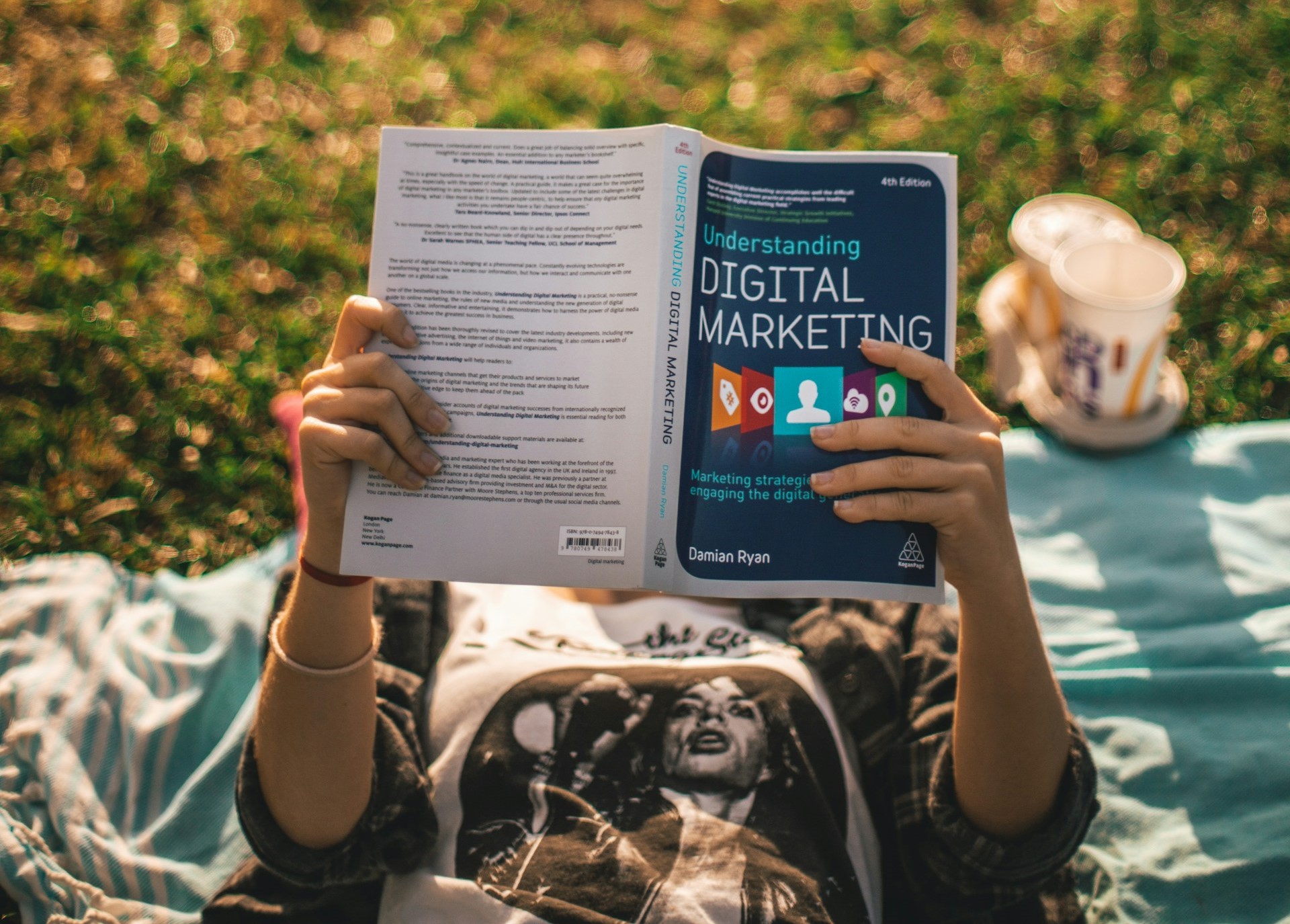 Girl reading digital marketing book